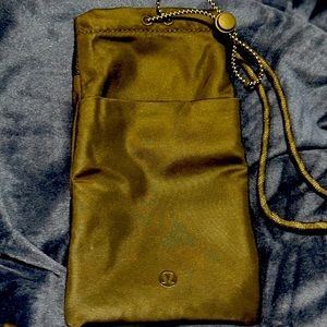 Lululemon adjustable neck pouch. Black water resistant fabric.